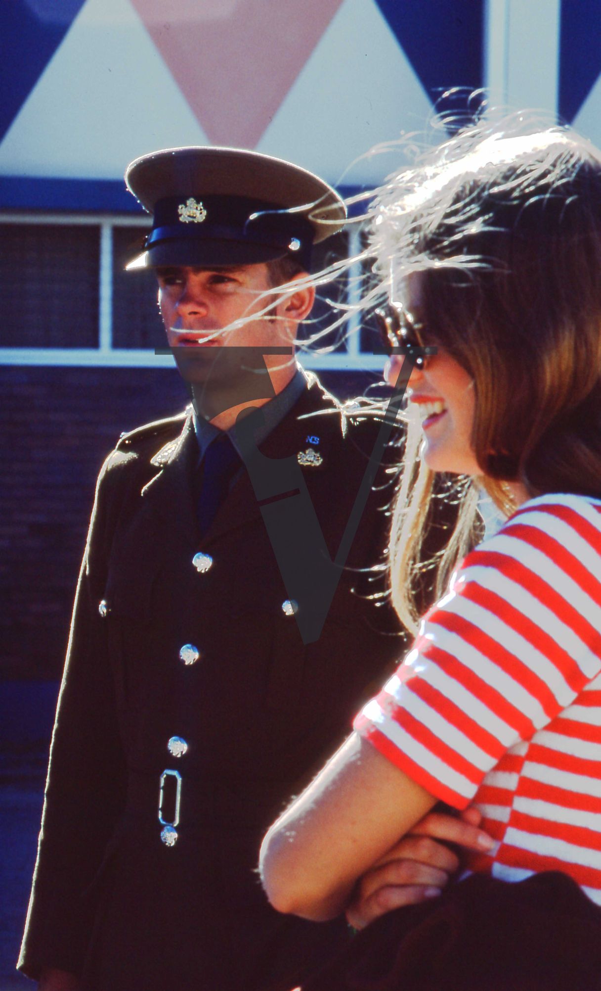Rhodesia, Rhodesian Light Infantry passing out ceremony, British South Africa Policeman (BSAP), woman, candid, mid-shot.