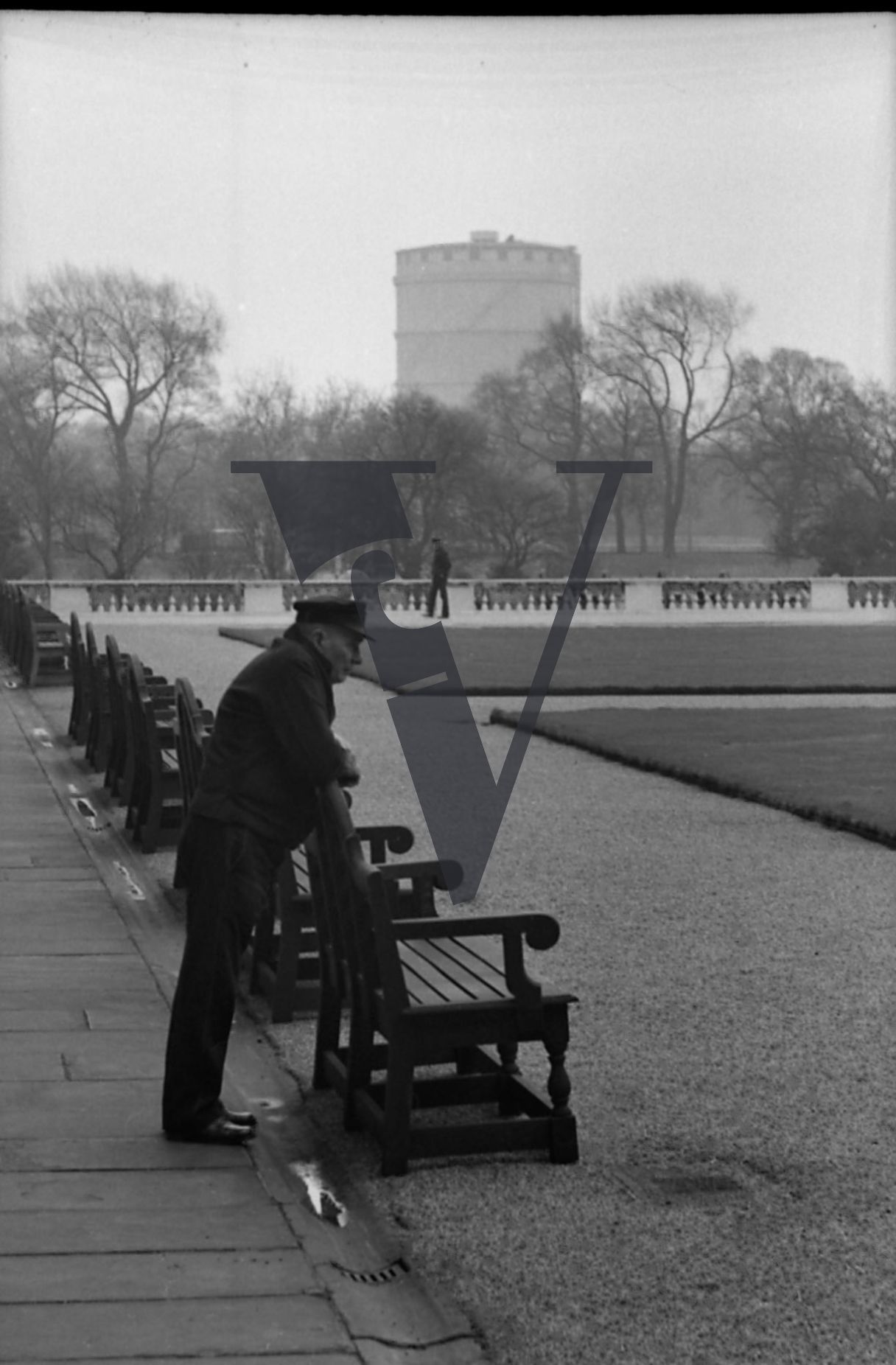 Royal Hospital, Chelsea Pensioners, man leaning on bench.