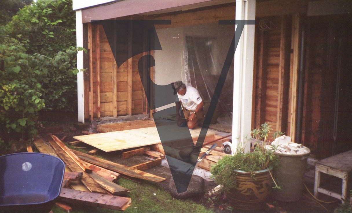 David Suzuki housebuilding in Vancouver, wooden materials, measuring.