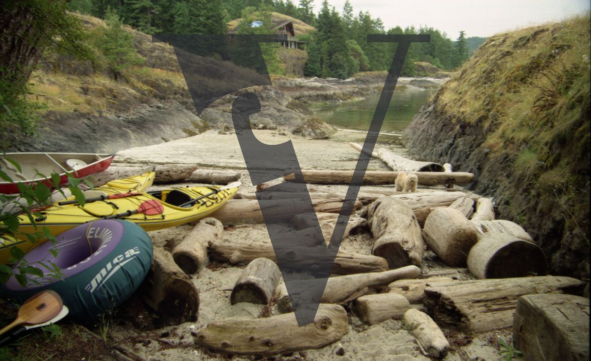 Osoyoos, Okanagan Valley, British Columbia, lakeside, canoes, logging.