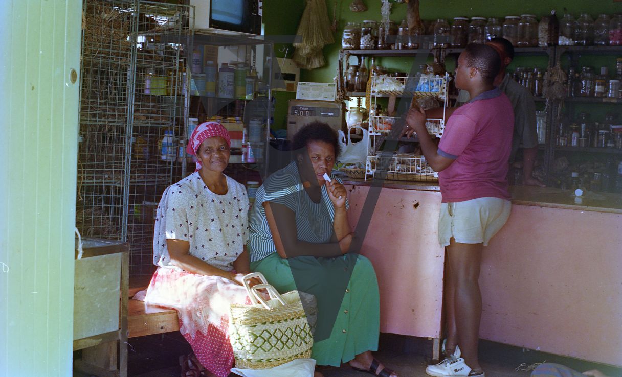 Sangoma, Zululand, Inyanga, three women in the Cele store.