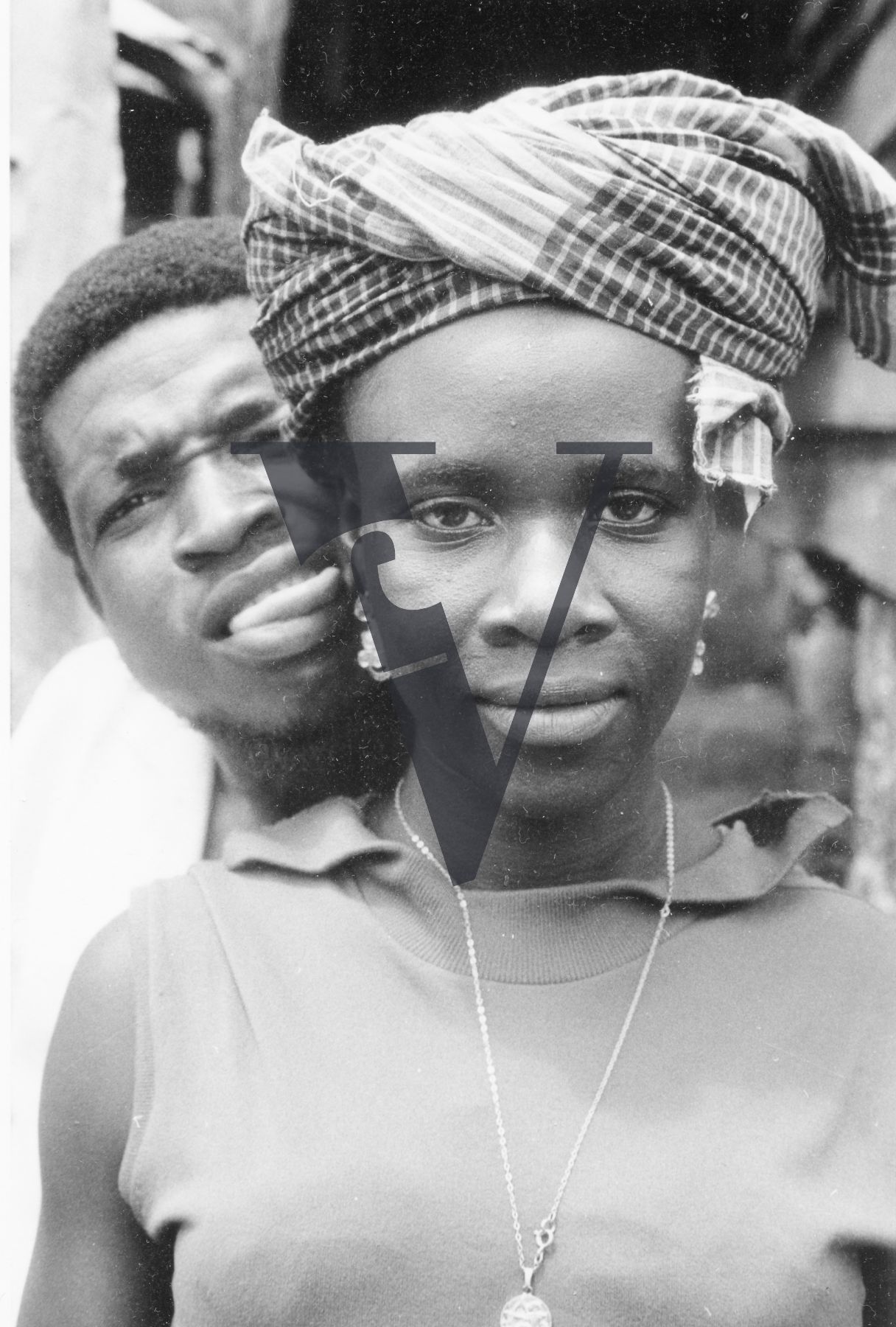 Sierra Leone, streets, portrait, woman and man, tongue out.