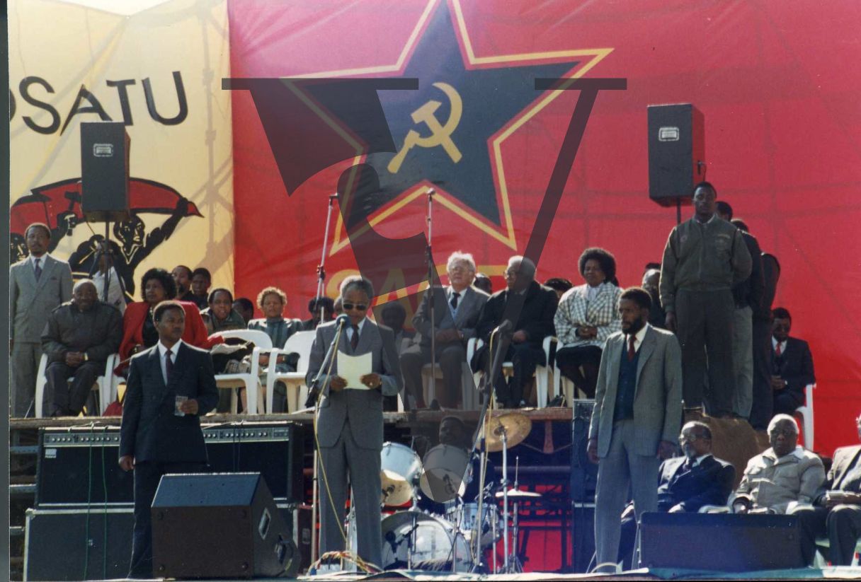 Nelson Mandela addresses crowd at Soweto Soccer Stadium.