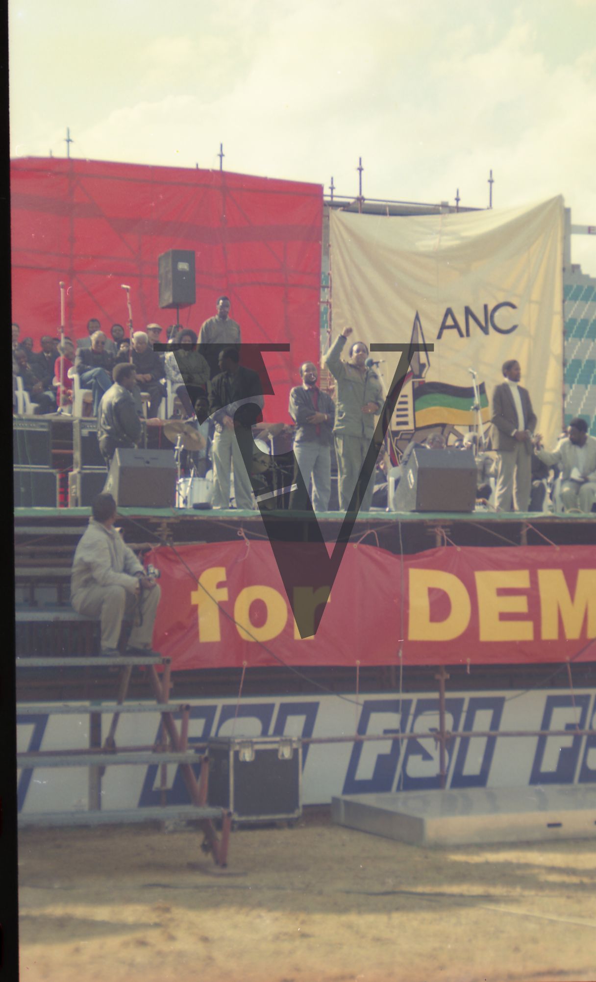 South Africa, Johannesburg, FNB Stadium, ANC rally, stage, speaker addresses crowd.
