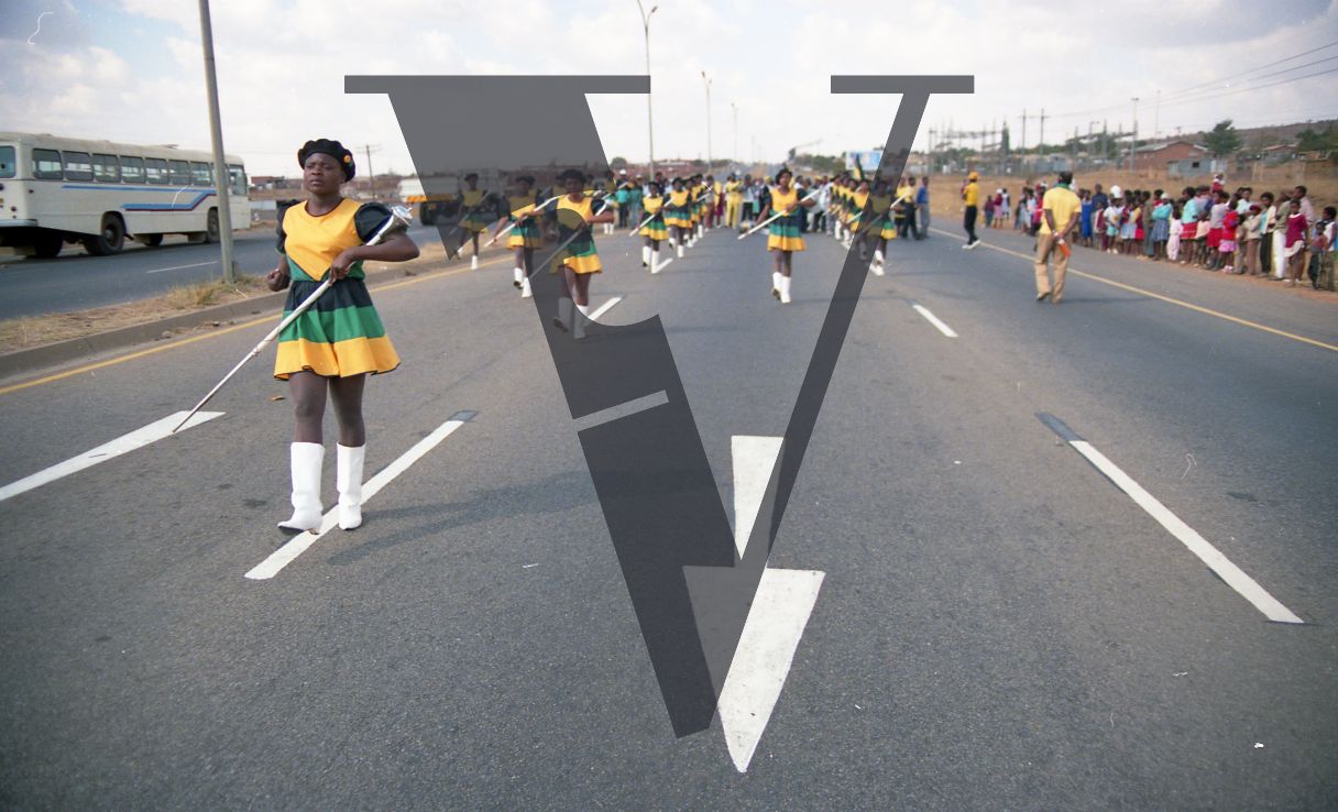 South Africa, ANC parade, women, uniform, batons, road markings.