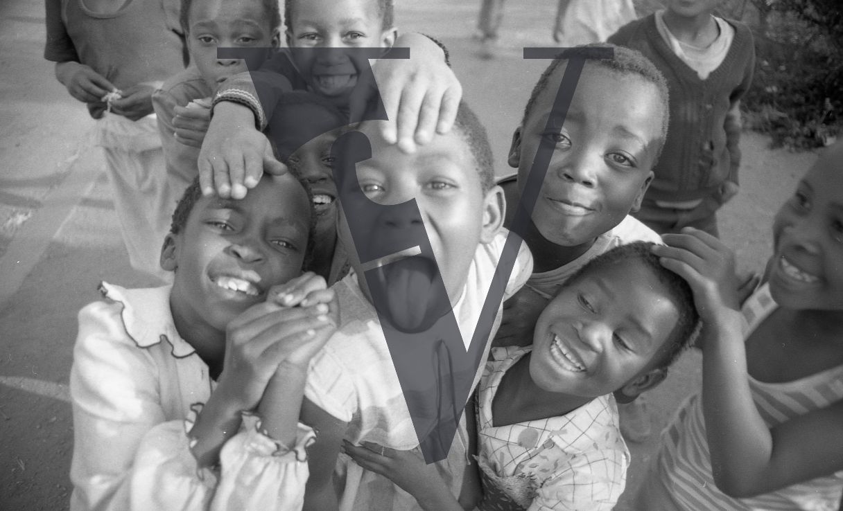 South Africa, township, children, smiling, portrait.