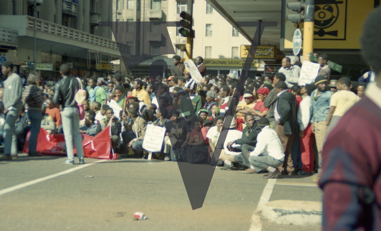 South Africa, street scene, protest, crowd, banners.