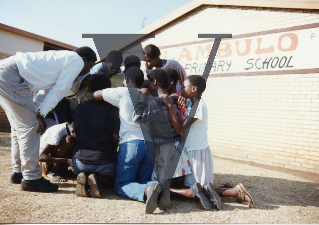 South Africa, Soweto, Peter Ngwenya, playwright, schoolchildren, Dlambulo Higher Primary School, exterior.