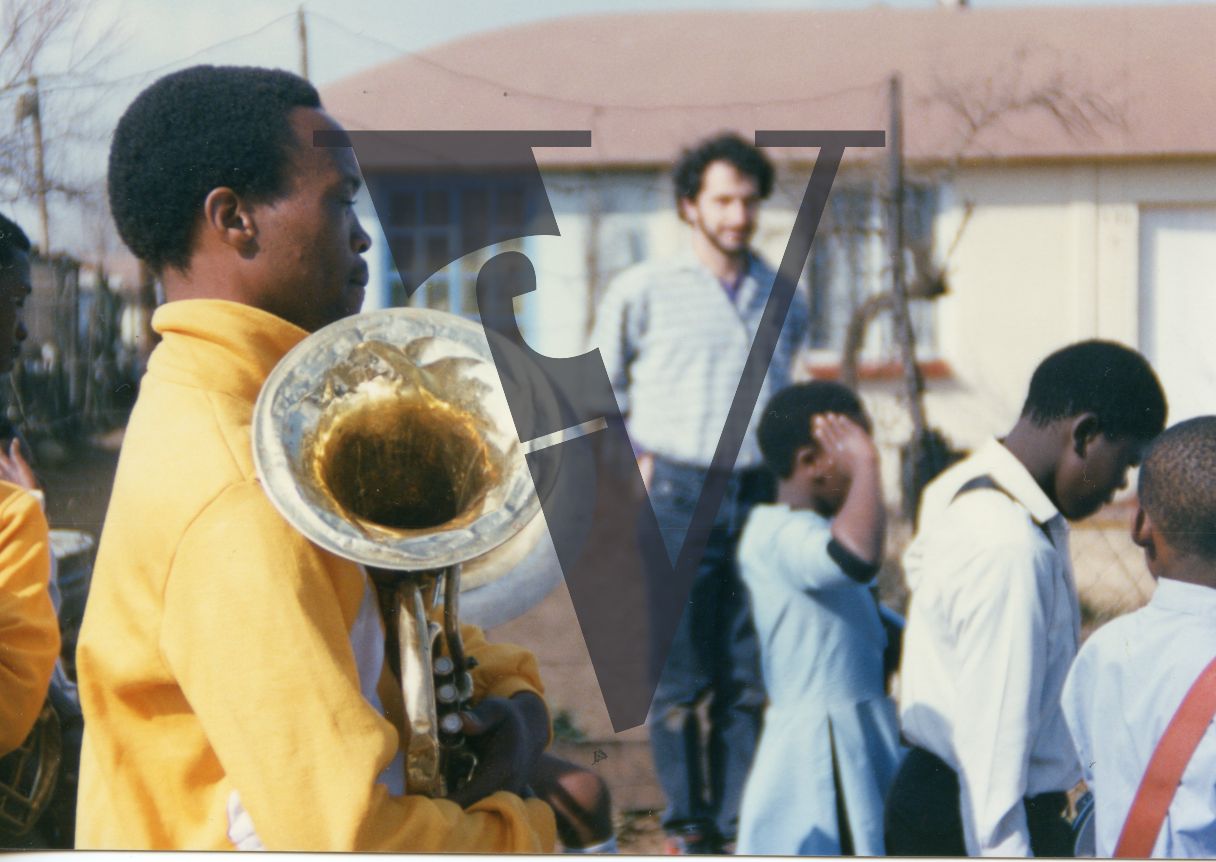 South Africa, Soweto, marching band, funeral procession, trombone, children.