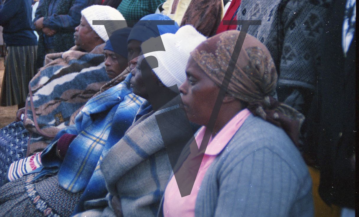 South Africa, Soweto, women mourners, profile, mid-shot.