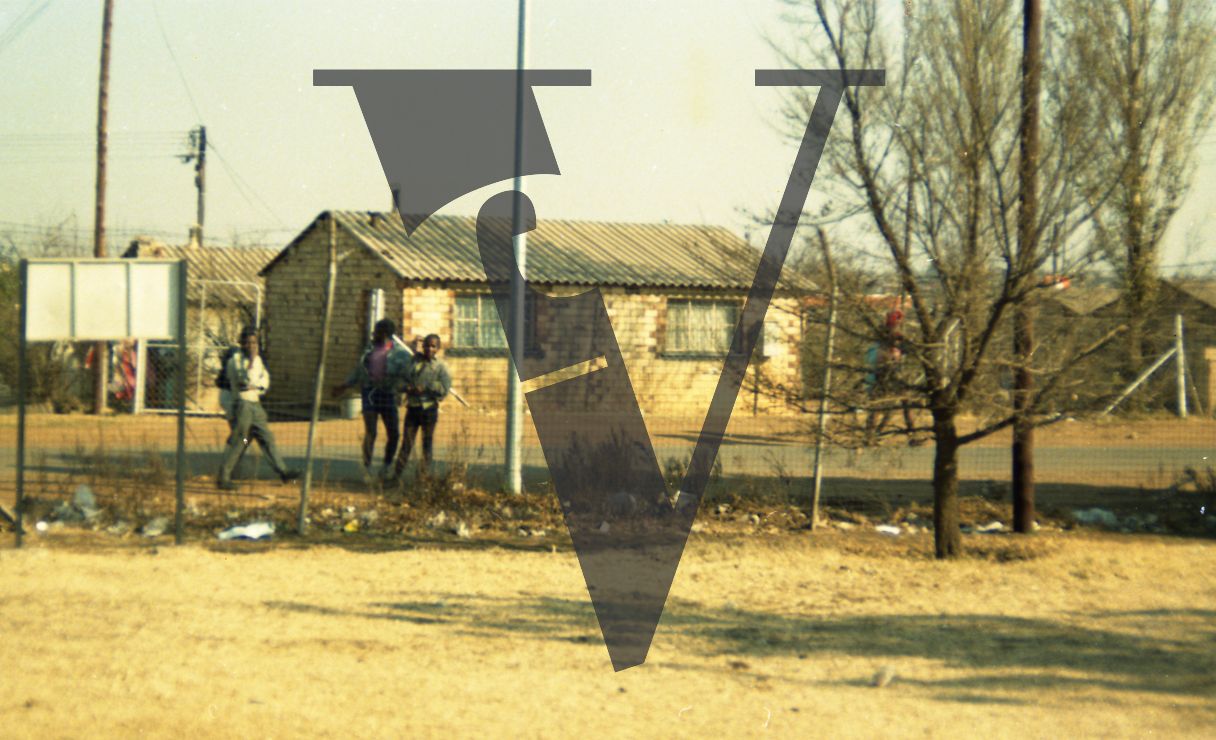 South Africa, township, adolescent boys and girls, exterior, full shot.