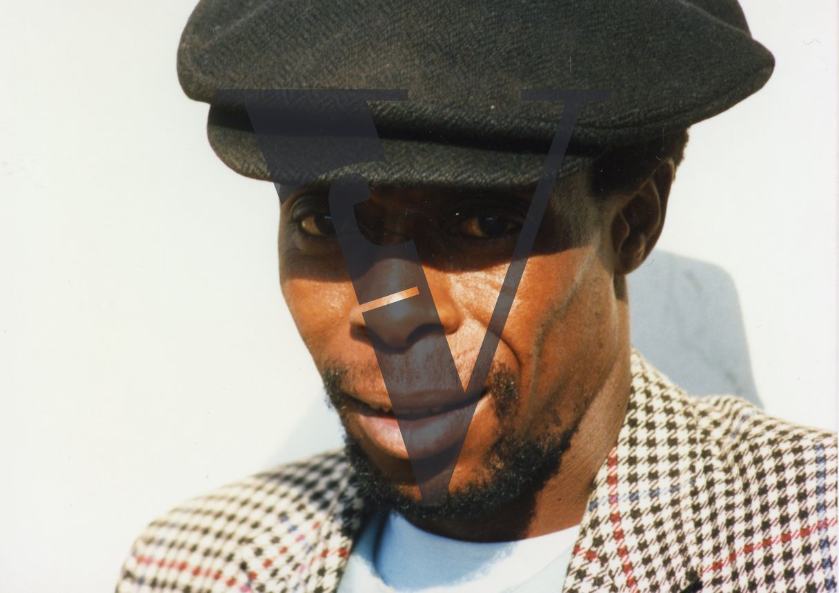 South Africa, man in soft cap, portrait, close up.
