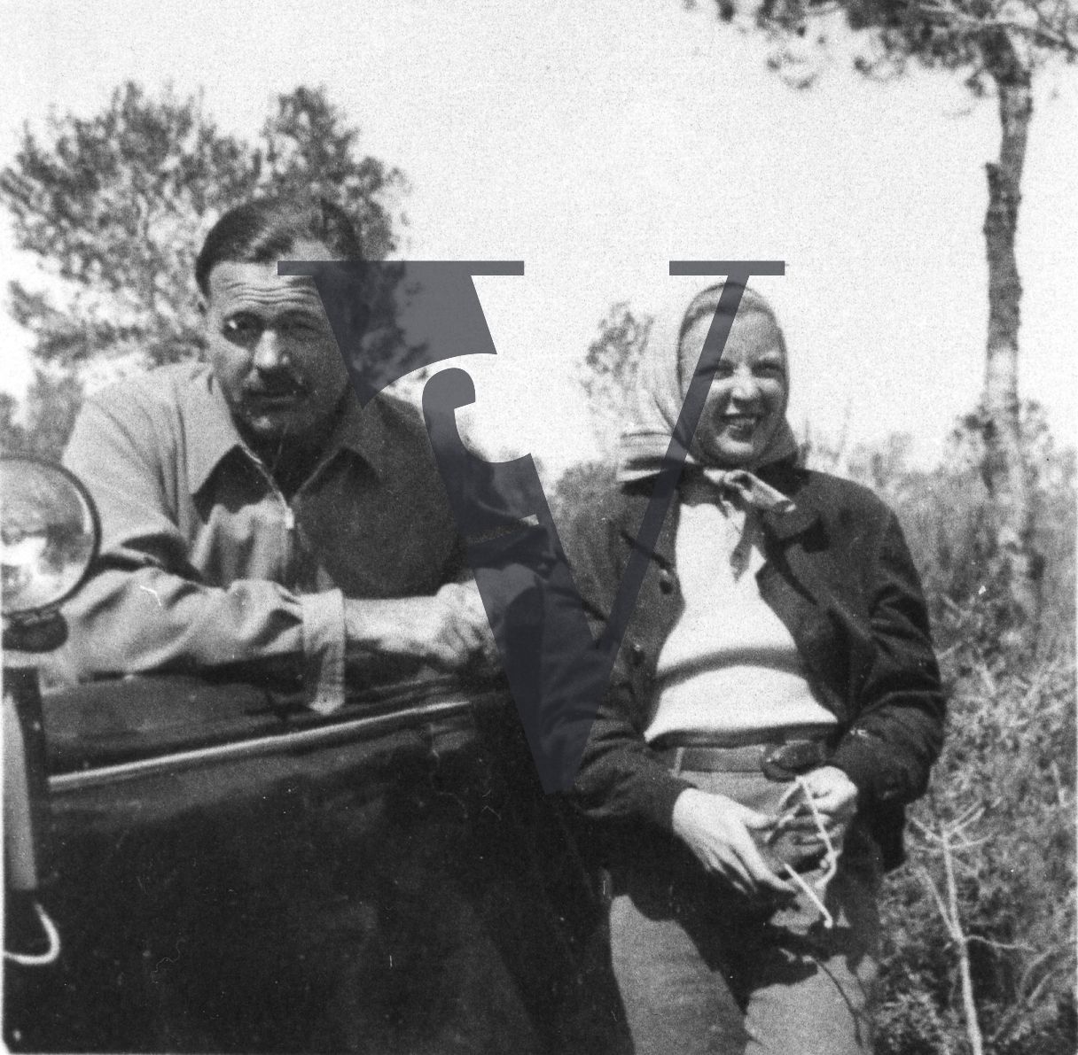 Spain, Ernest Hemingway, Martha Gellhorn, portrait, exterior, car, mid-shot.