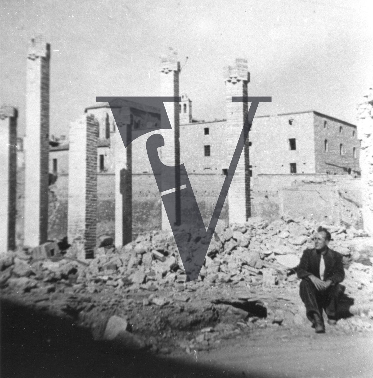 Spain, Herbert Matthews, portrait, building ruins, full shot.