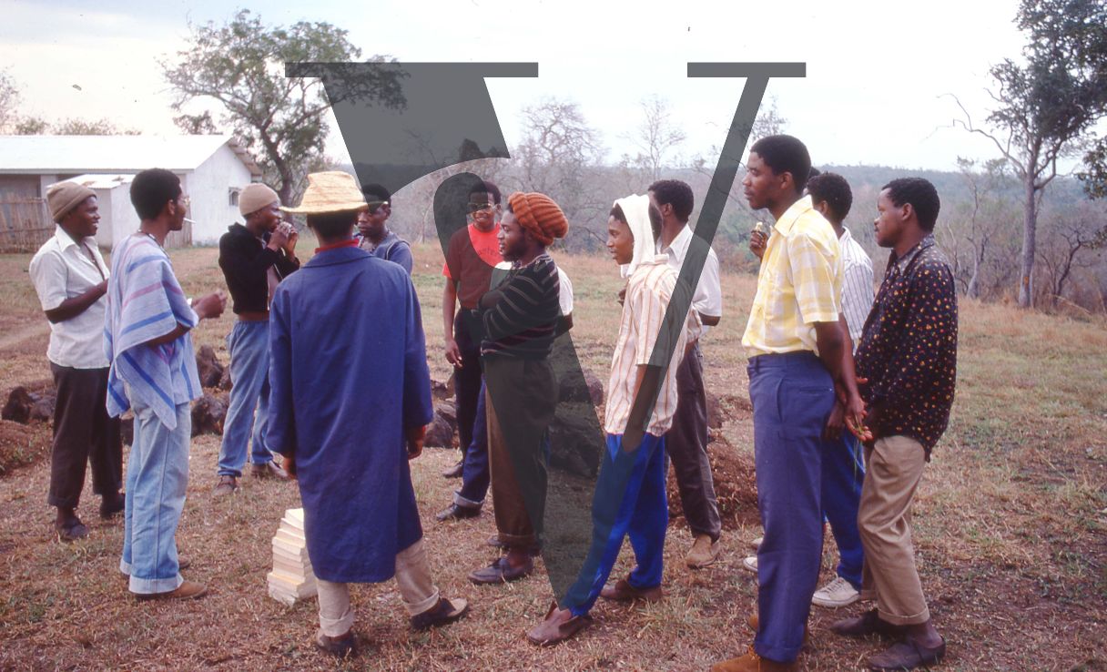 Tanzania, PAC, Pan Africanist Congress camp, standing and talking.