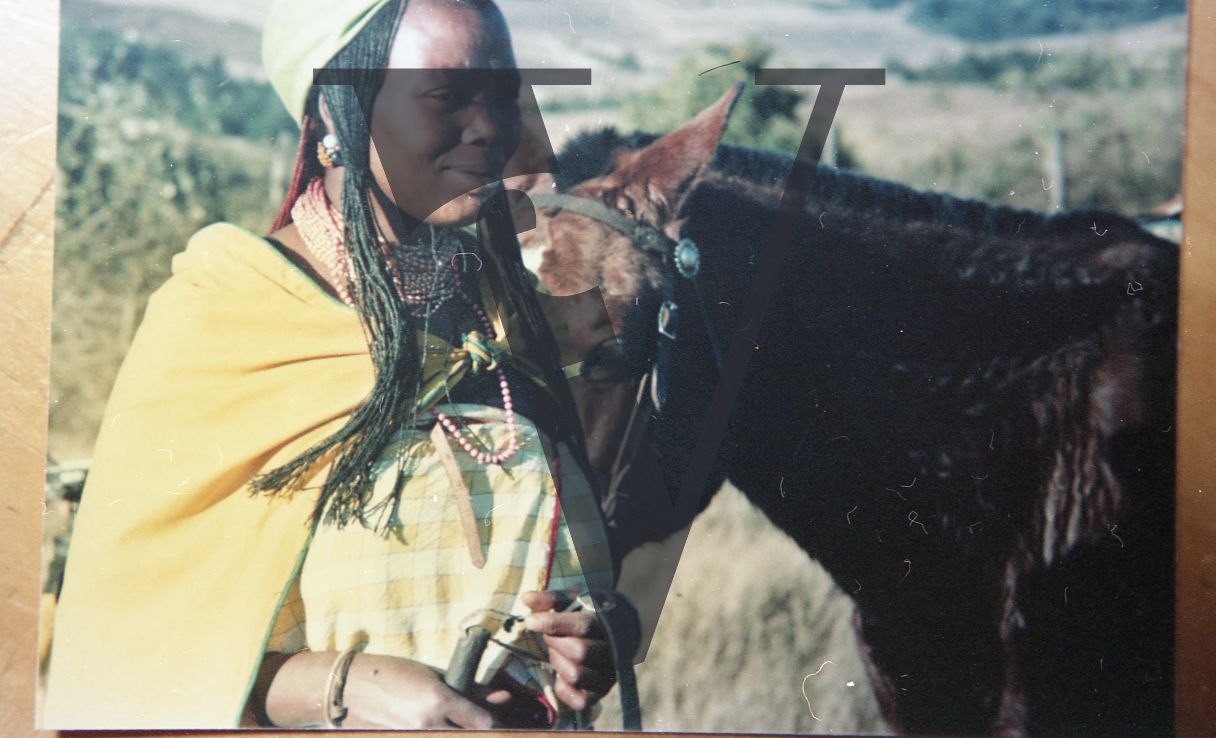 South Africa, Transkei, woman smiling, horse.