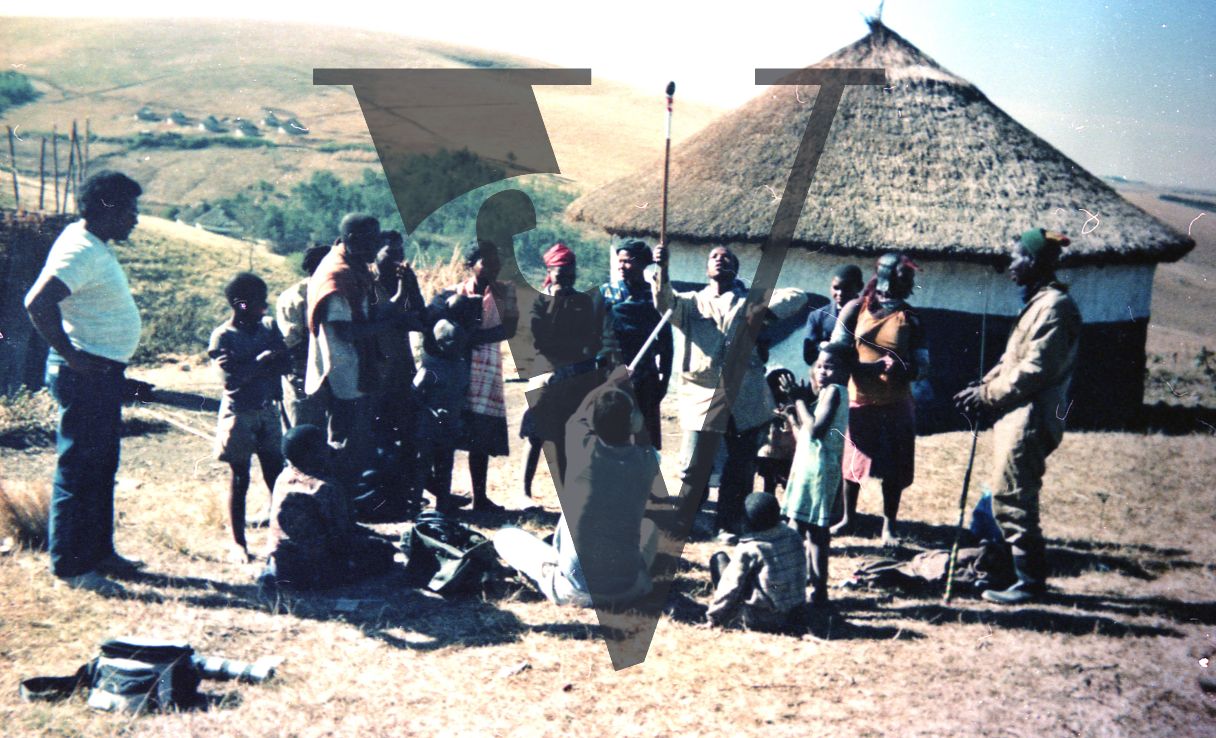 South Africa, Transkei, group of people, uRonta, Xhosa hut, David Mesenbring recording.