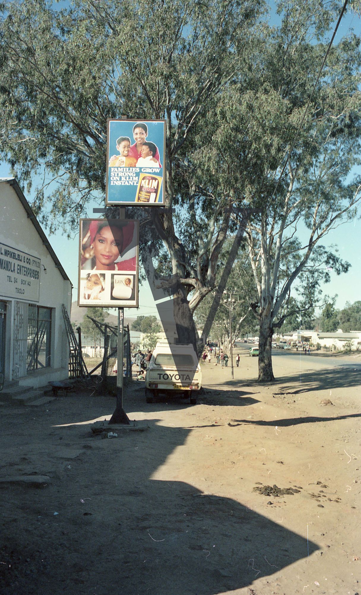 South Africa, Transkei, Bizana, street scene, billboard advertising.