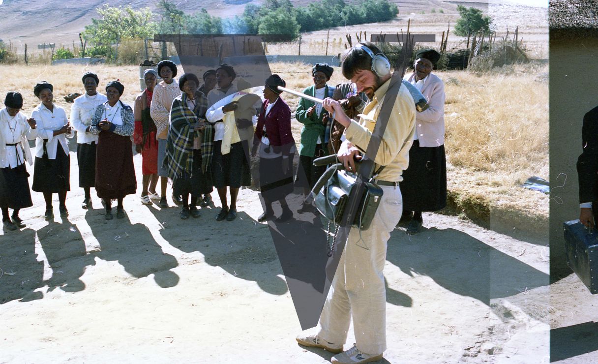 South Africa, Transkei, group of women, infant, David Mesenbring, recording.