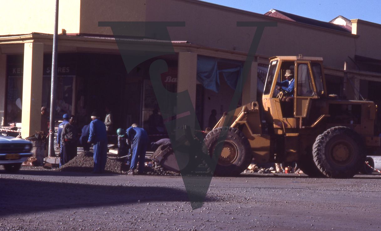 South Africa, Transkei, street scene, road workers, digger.