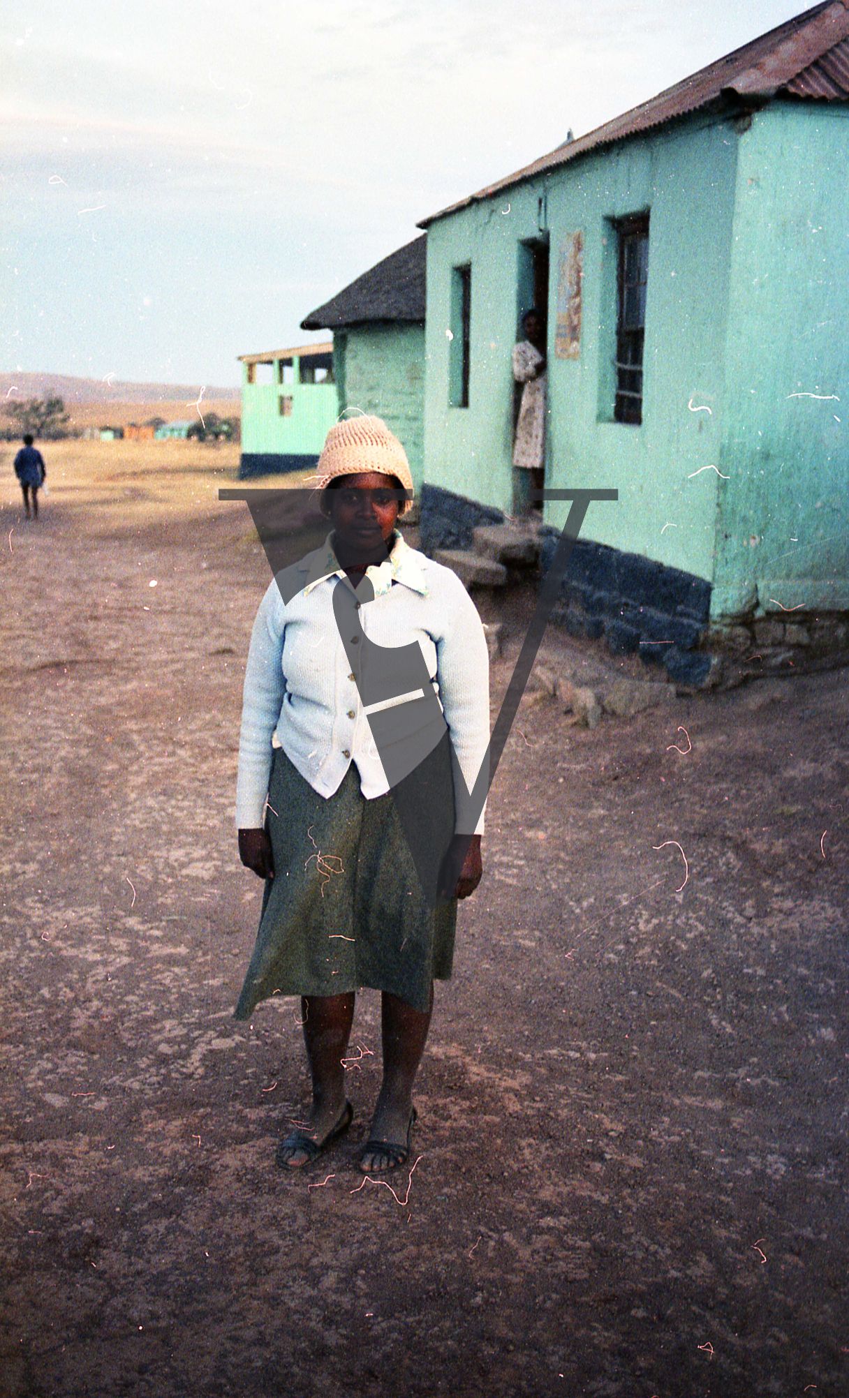 South Africa, Transkei, woman, uRonta, traditional Xhosa hut, full shot, portrait.
