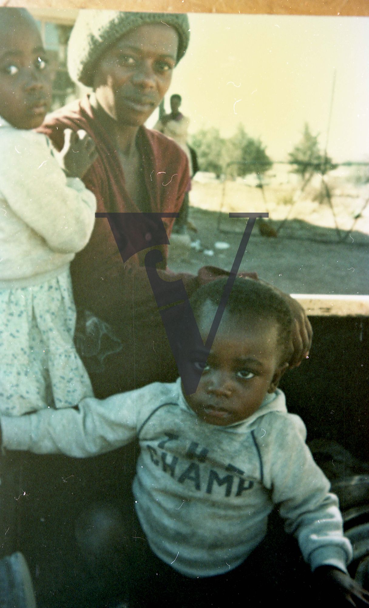 South Africa, Transkei, woman, two children, portrait.