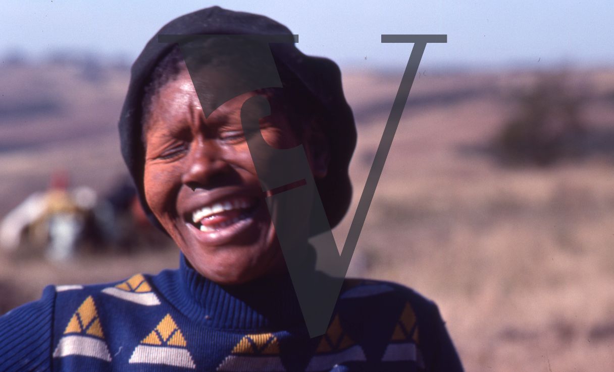 South Africa, Transkei, woman laughing, headshot.