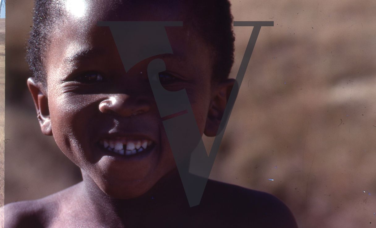 South Africa, Transkei, young boy, smiling, close-up, portrait.
