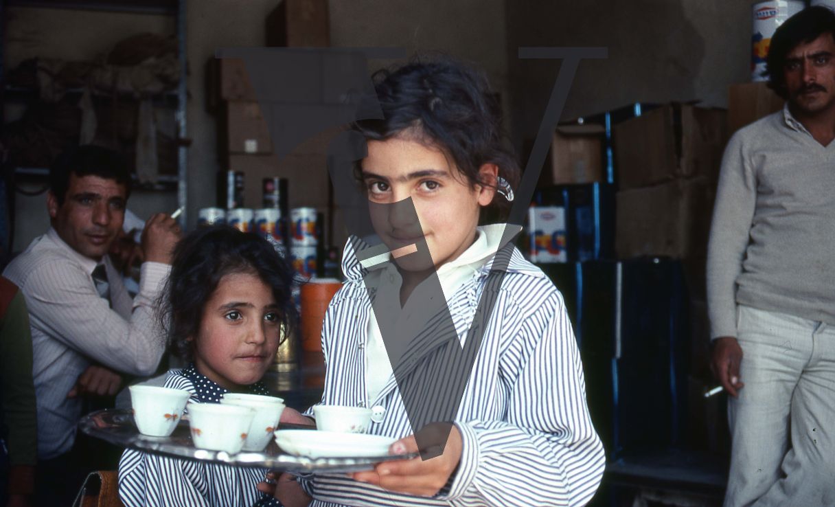 West Bank, Al-Khader, children with tea, portrait.