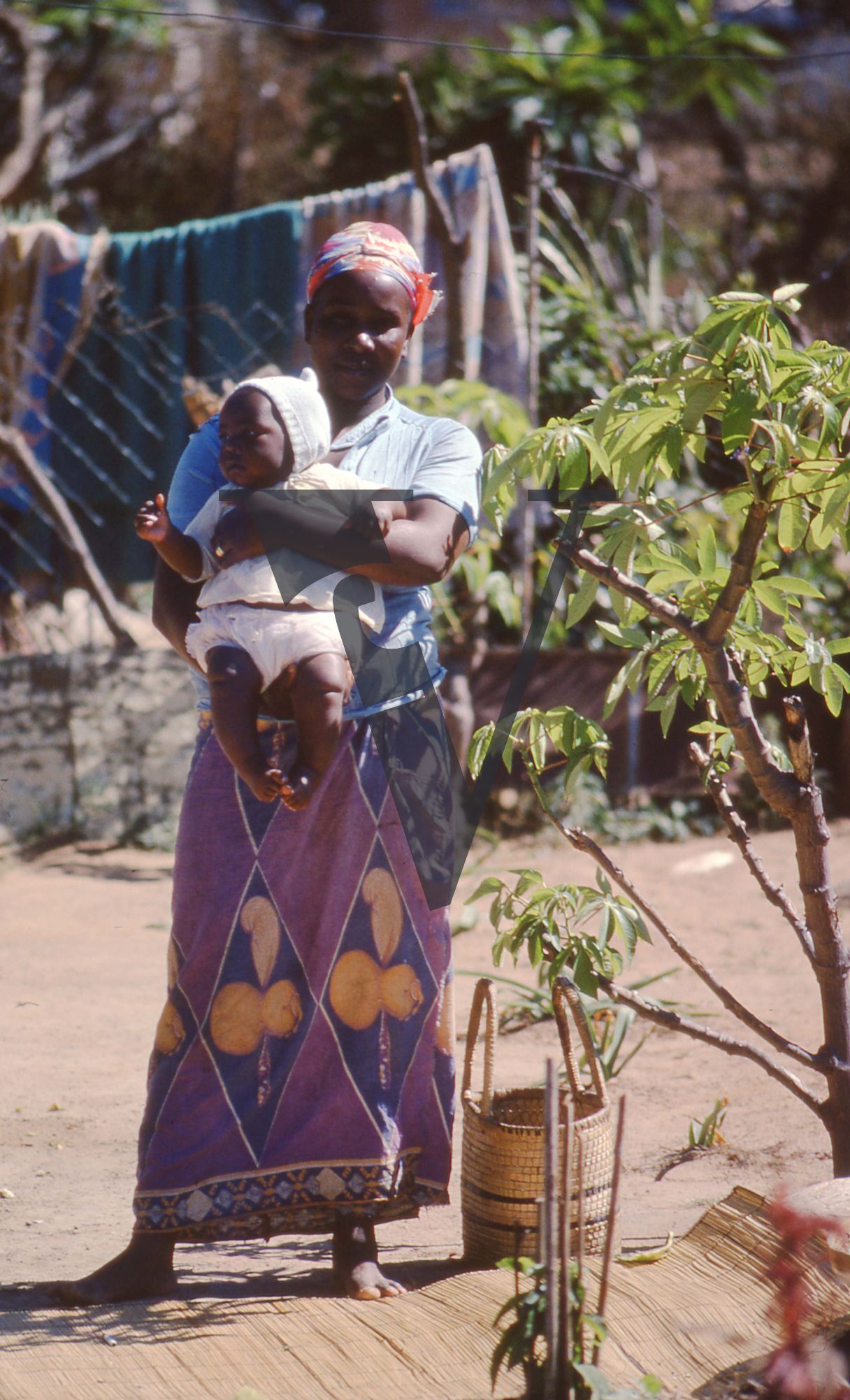 Zambia, Lusaka, woman and baby, portrait.