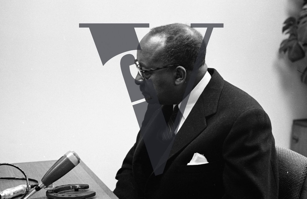 Elmer Anderson Carter, portrait, State Commission Against Discrimination, microphone.