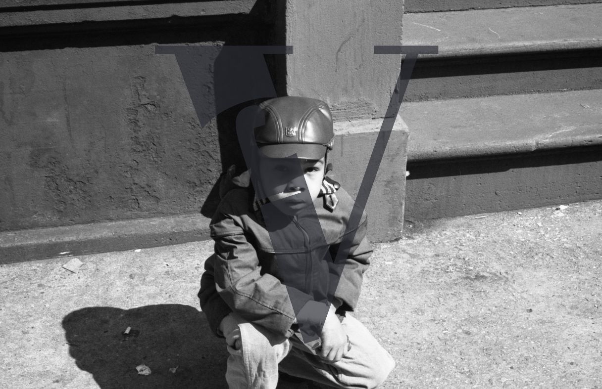 Harlem, New York City, small child, leather hat, portrait.