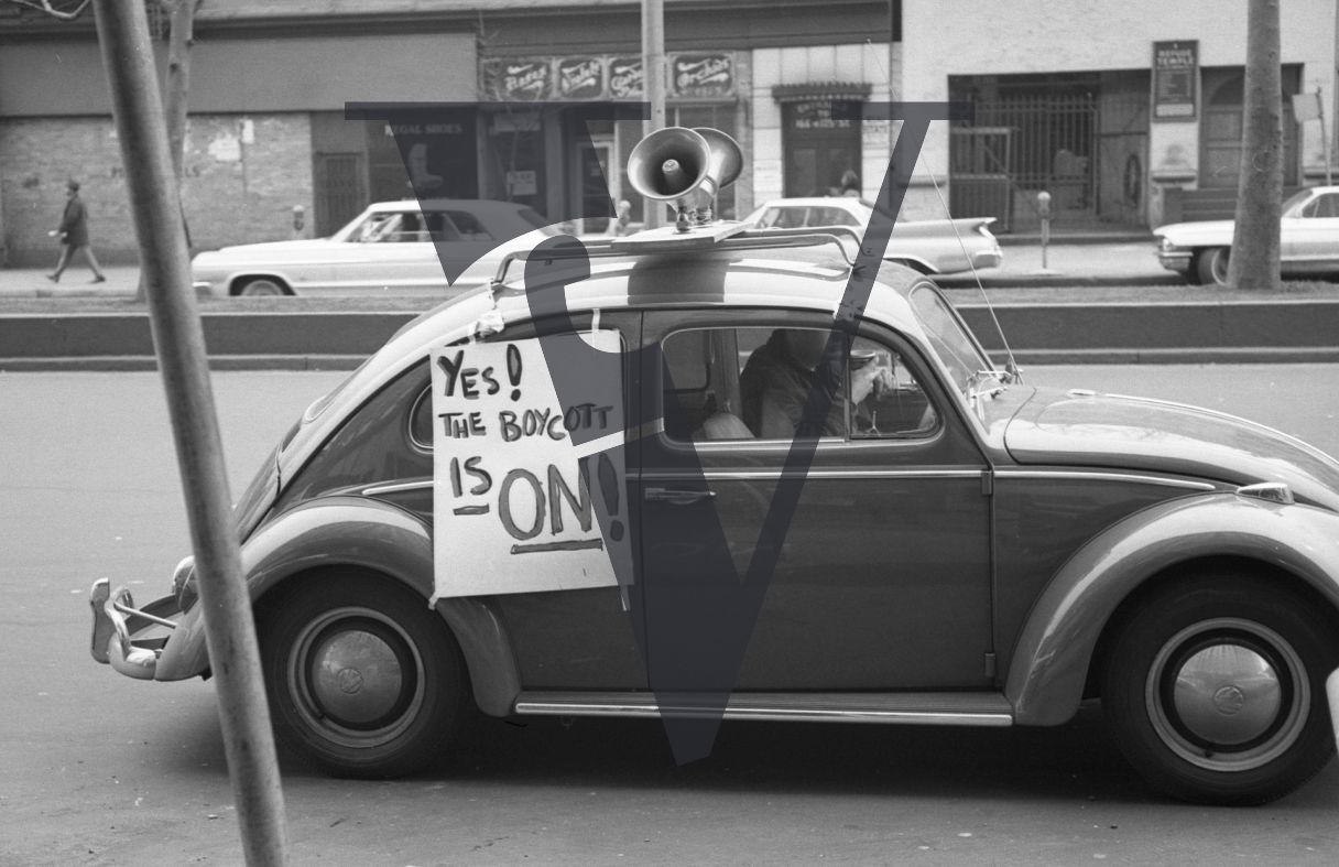 Harlem, New York City, Volkswagen Beetle, Yes The Boycott Is On! sign.