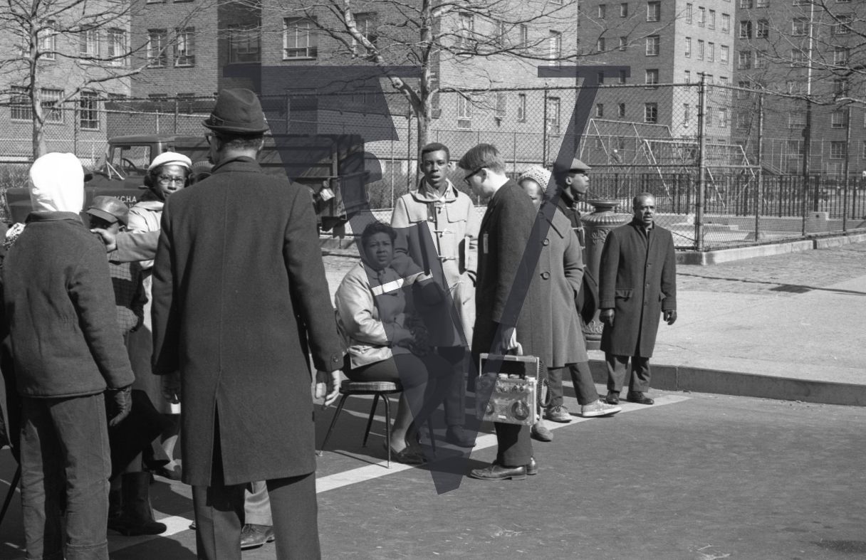 Harlem, New York City, John Hancock School protest, man with recorder.