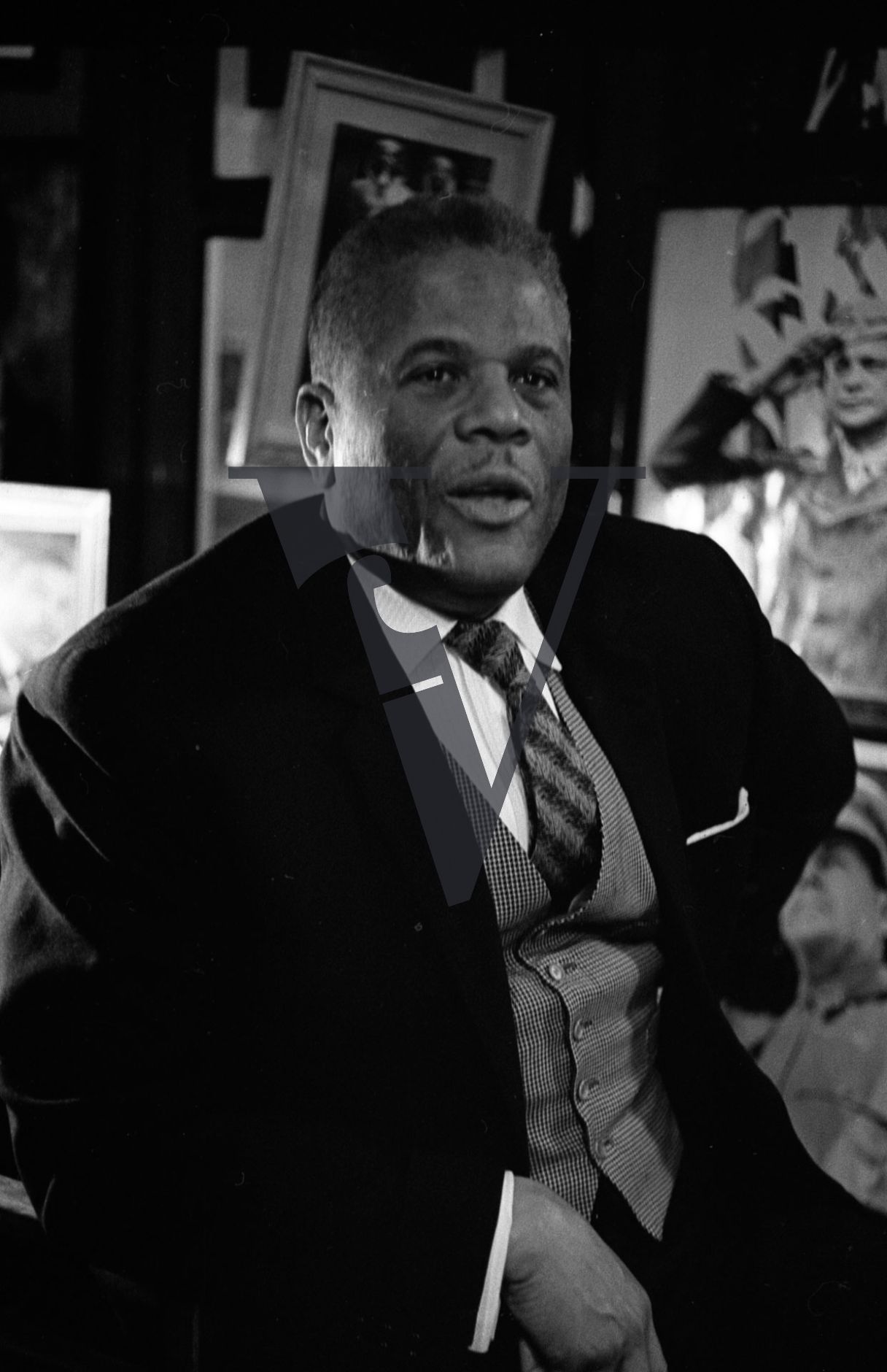 Hubert Julian, portrait, famous aviator, Trinidadian, to camera, African National Memorial Bookstore in Harlem,.