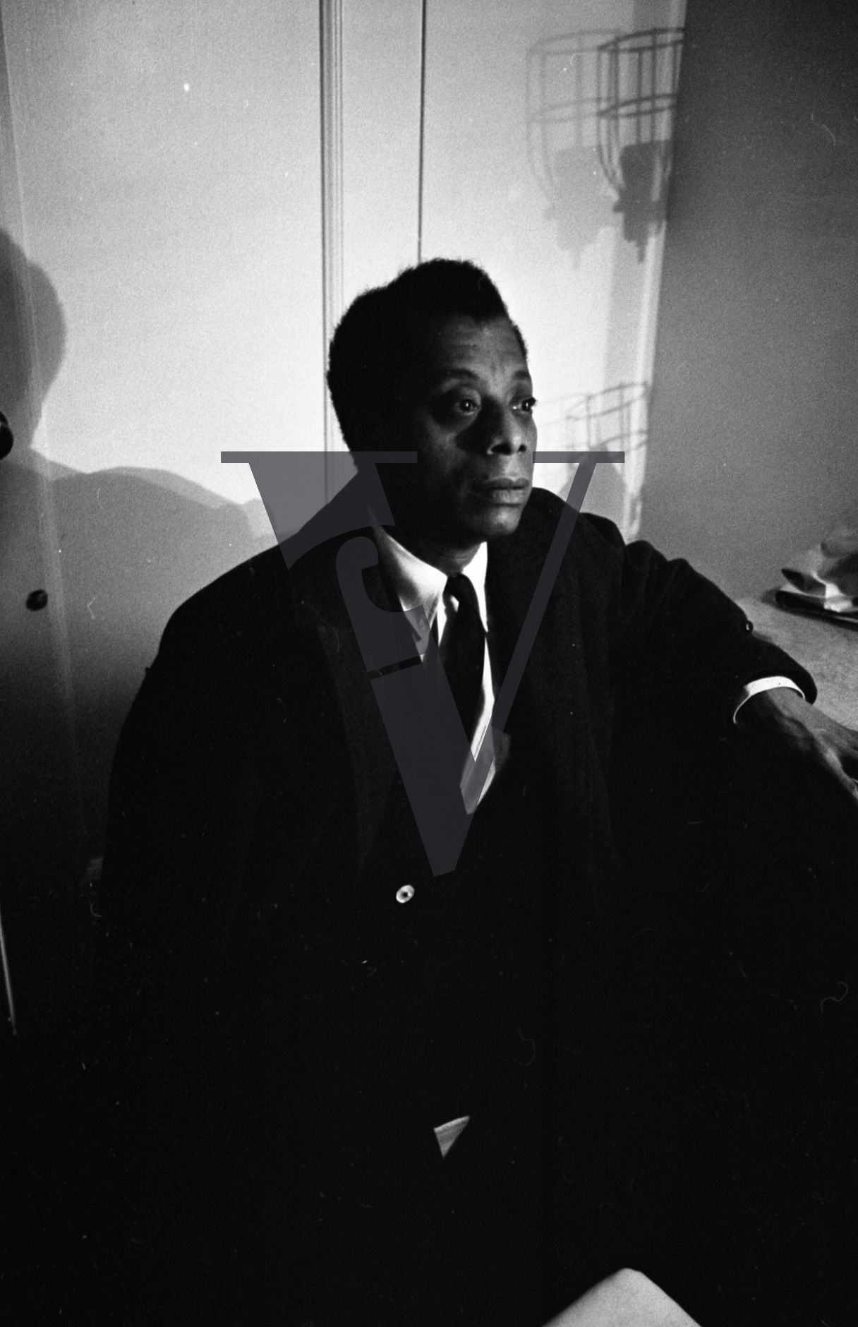 James Baldwin, portrait, Harlem, writer, looking forward.