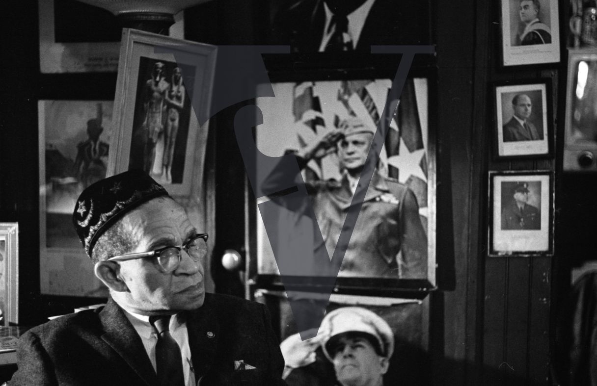 Lewis Michaux, African National Memorial Bookstore in Harlem, portrait, military posters.