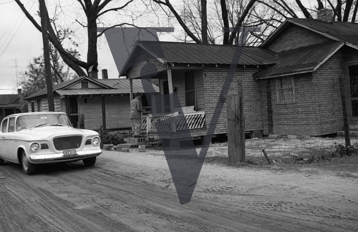 Sumter, South Carolina, street scene, car, houses.