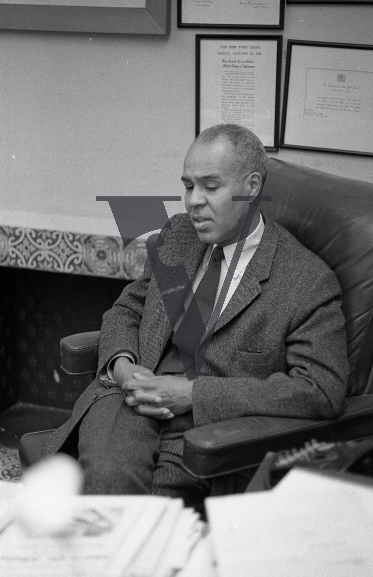 Roy Wilkins, leader, National Association for the Advancement of Colored People, NAACP, portrait, hands-clasped.