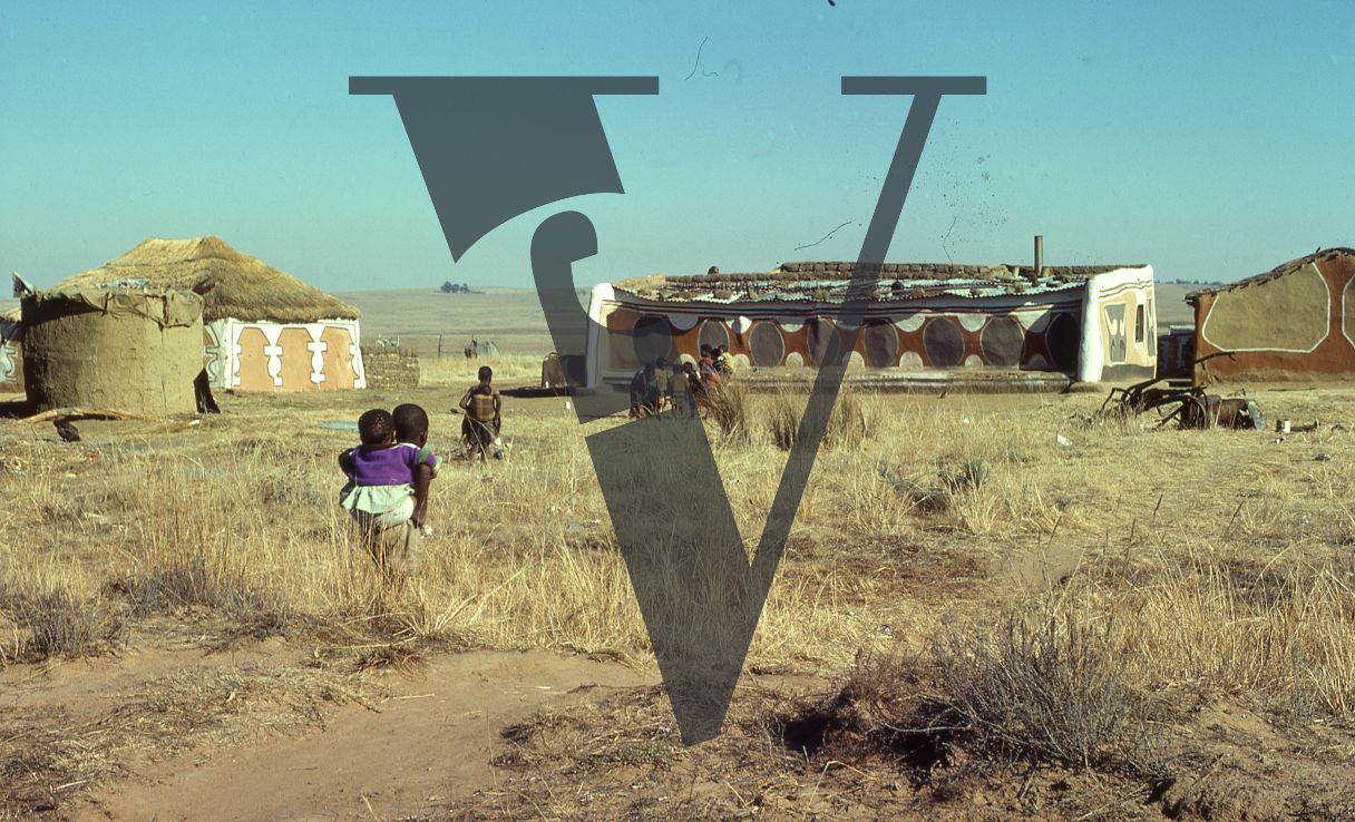 Eswatini, Kraal, houses, village, children playing.