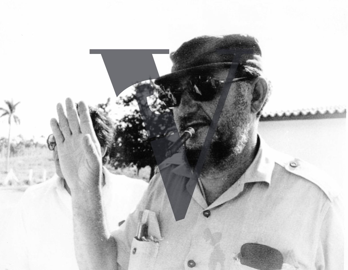 Cuba, Ramón Eusebio Castro Ruz, portrait, hand aloft, cigar.