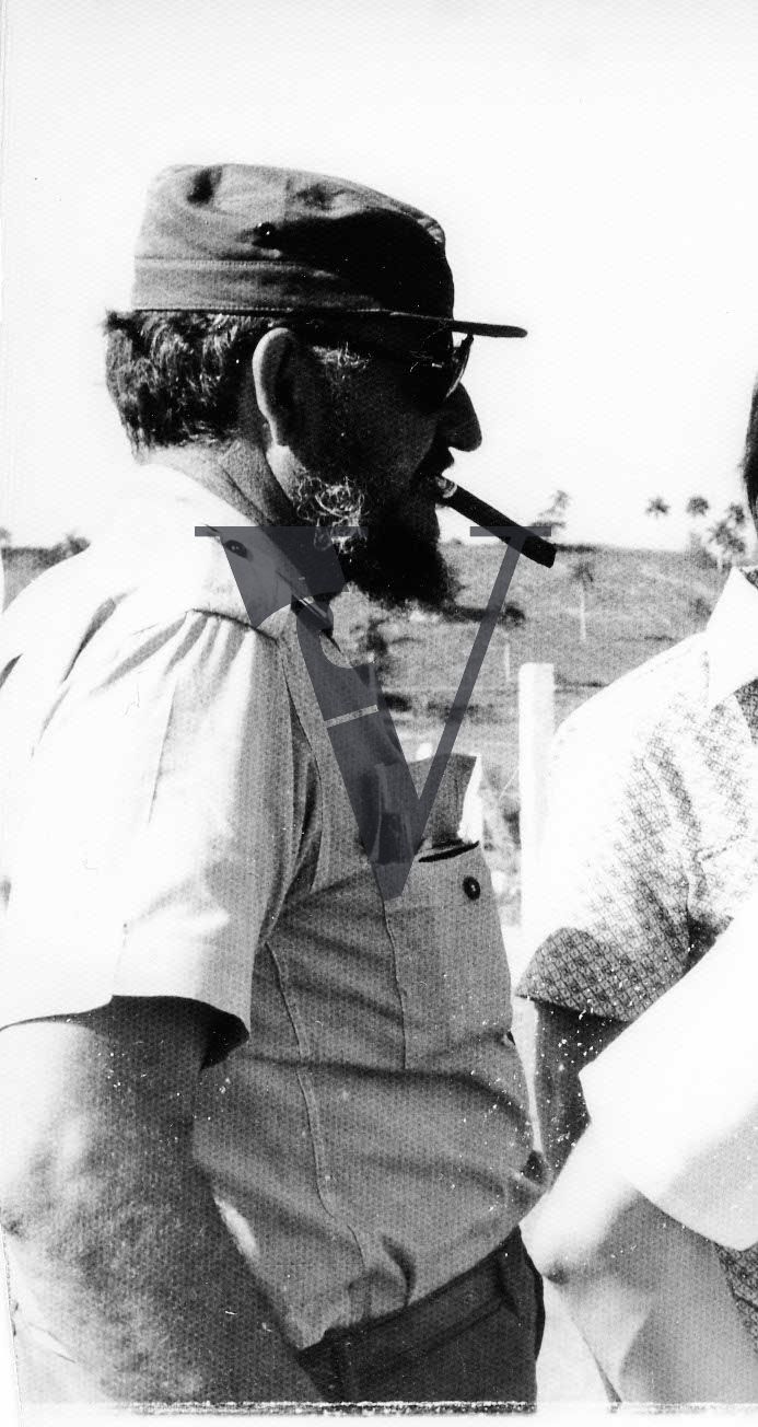 Cuba, Ramón Eusebio Castro Ruz, portrait, side-view cigar.